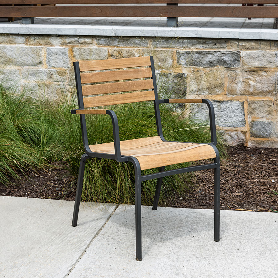 Ethos stacking teak and powdercoated steel dining armchair in Charcoal
