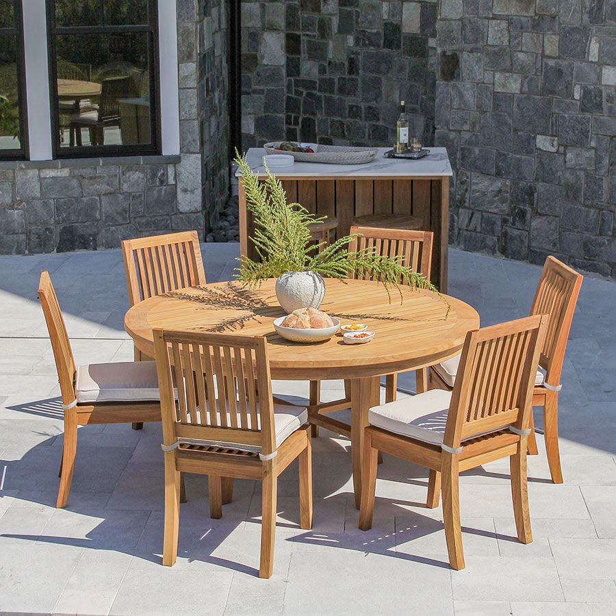 Seneca solid teak outdoor 5 ft round dining table and chair set for 6 - 8.